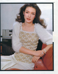 Patricia modeling a white mohair sweater