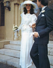 Patricia wearing a wedding dress with groom